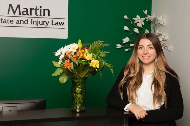Law and Justice Program alumna Abby Comeau at her work