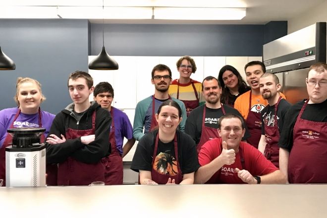A group of SOAR students in the kitchen