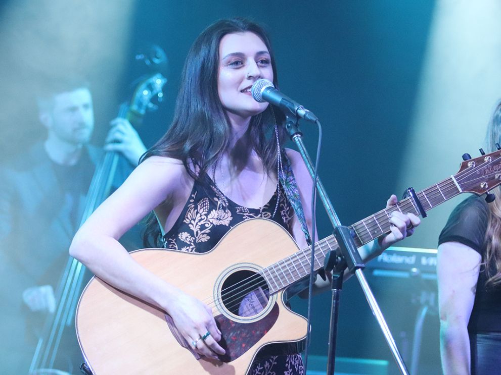 Music student singing at the Shambhala Music &amp; Performance Hall