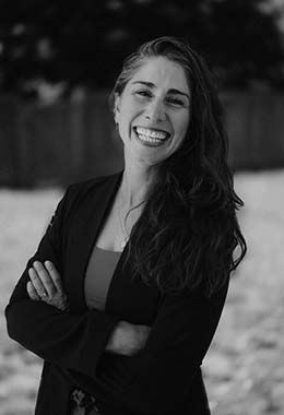 Pegah Pourkarimi stands smiling