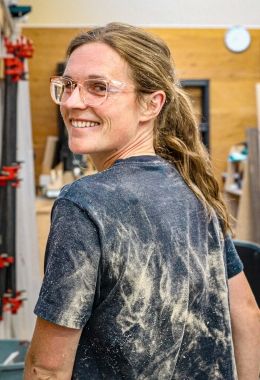 Kailey Allen smiles in the shop